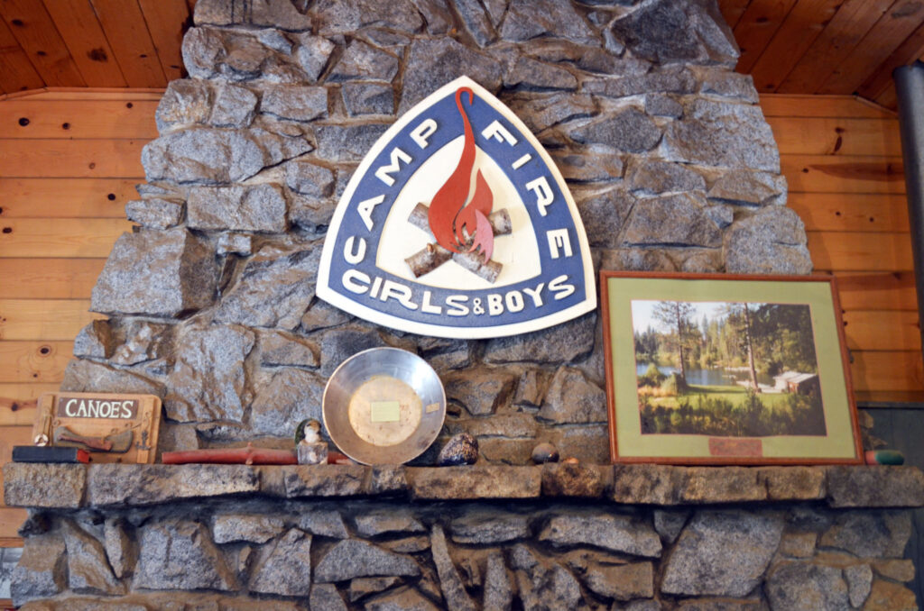 Camp Fire logo on fireplace hearth