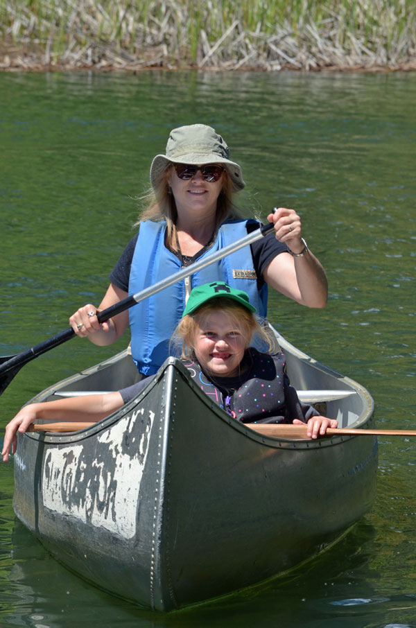 woman and child canoeing